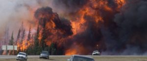 A giant fireball is seen as a wildfire rips through the forest along Highway 63, 16kilometres south of Fort McMurray, Alta., Saturday, May 7, 2016. Wildfire experts say dangers from the Fort McMurray fire won't end when the flames stop.Officials from California, where wildfires burn residential areas every summer, say ash left behind in a city is considerably more dangerous than ash from a burned forest.THE CANADIAN PRESS/Jonathan Hayward